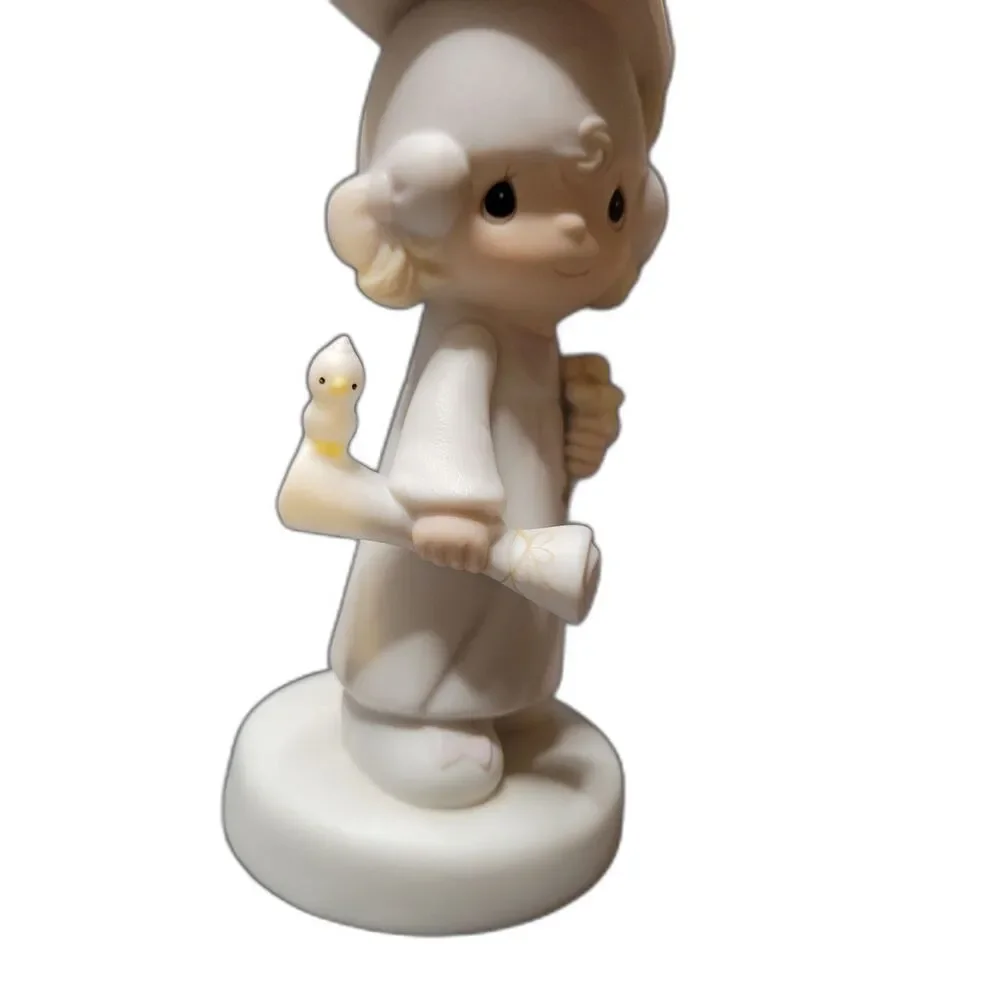 Precious Moments graduation figurine